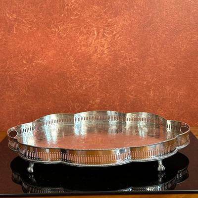 Silver Plate on Copper Footed Tray | Silver plate on copper serving tray with scalloped gallery edge, side handles and claw feet. After...