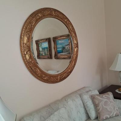 large round neo classical mirror in gold gilt frame