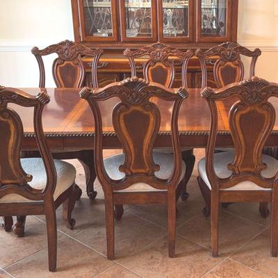 Large Dining Room Table And Eight Decorative Wooden Chairs
