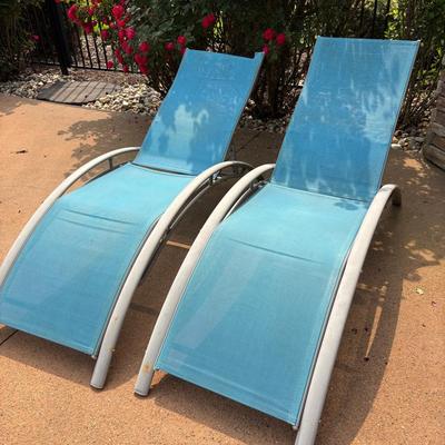 Two Chaise Lounge Chairs