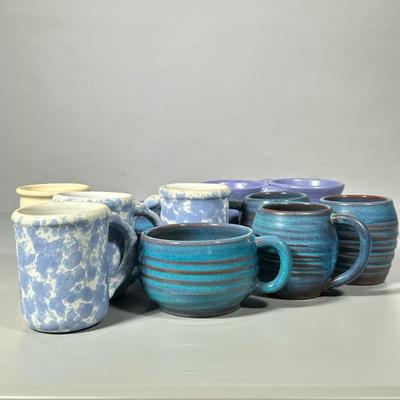 (11pc) Miscellaneous Mugs | Pottery mugs in shades of blue and white. All marked and signed. Some matching/pairs. - h. 3 x dia. 4.5 in...