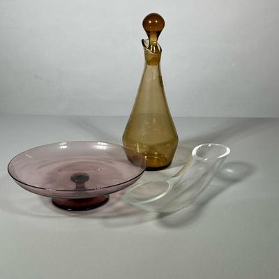 (3pc) Miscellaneous Glass Pieces | Auburn Oil or vinegar jar from Bloomingdale’s, petite cake plate and unusual tube vase. - h. 9.5 x w....