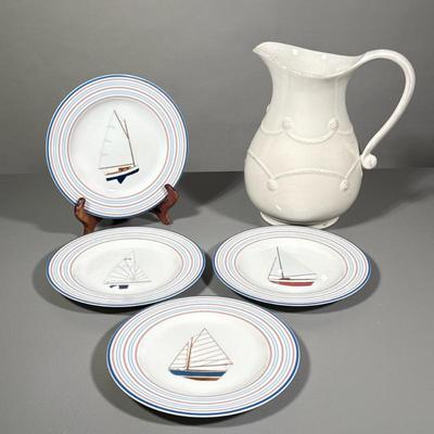 (5pc) Pitcher And Plates | Large white ceramic pitcher and 4 small red, white and blue plates with different sailboat on each. - h. 10.5...