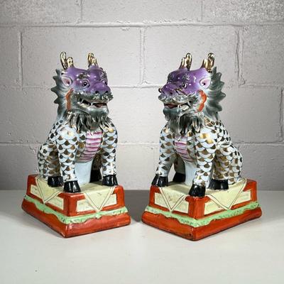 (2pc) PAIR OF COLORFUL CERAMIC FOO DOGS | Pair of colorfully glazed ceramic foo dogs with gilt design - h. 14 x w. 6 x d. 8.75 in
