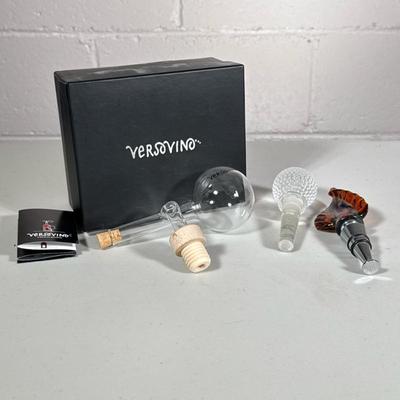 (3pc) WINE GROUP | Including: New in box Versovino Il Decanter piccolino, Mikasa crystal bottle stopper, and Murano Glass topped bottle...