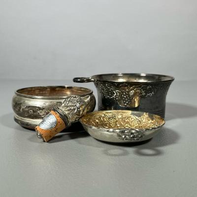 (4pc) SILVER PLATE WINE ITEMS | Including: silver plate tastevin, potentially Sterling silver & wood bottle coaster, silver plate...
