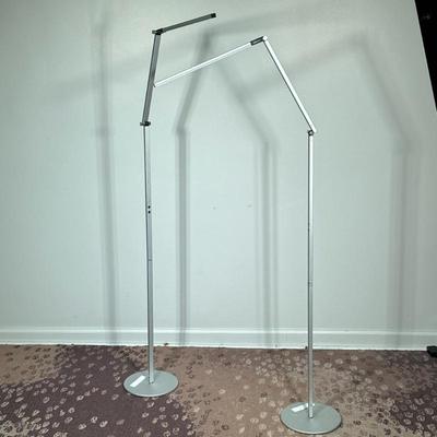 (2pc) PAIR KONCEPT FLOOR LAMPS | Pair of articulating aluminum KONCEPT floor lamps Dimensions: h. 74 x w. 31 in (fully extended in each...