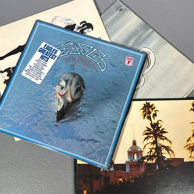 (4pc) Eagles And Chicago Vinyl | Including Chicago KGP24 with original poster Rumours Bsk3010 with insert Hotel California 6e-103...