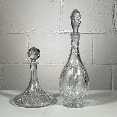 (2pc) Decanturs | Including cut crystal sherry decantur from Croatia with stopper and taller cut glass origin unknown. - h. 16 x w. 5 in
