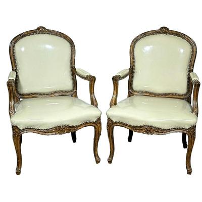 (2pc) PAIR OF LOUIS XVI STYLE ARMCHAIRS | Lewis Mittman Inc Louis XVI style armchairs having carved floral top over riveted back &...