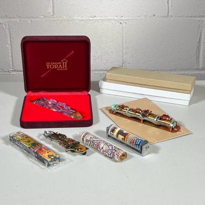 (6pc) MIXED MEZUZAHS | Including: Hand painted & acrylic mezuzah, hammered copper mezuzah, Garden of Eden mezuzah, carved wood...