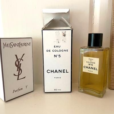 CHANEL No. 5 And Yves Saint Laurent Parfum Y Bottles Of Perfume In Boxes