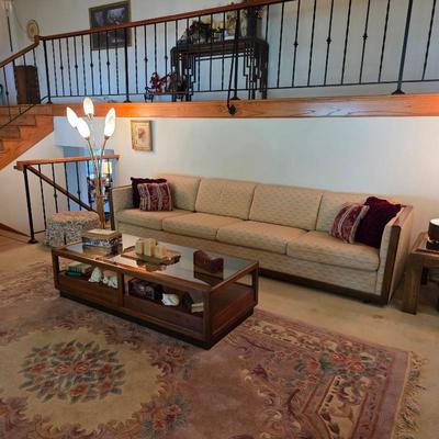 Mid century sofa, coffee table, and mid century modern lamps