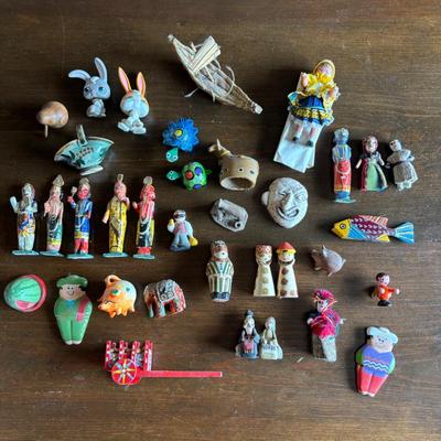 Lot #167 - Vintage Mini Tchotchkes, Including Hindu God Figurines, Worry Dolls, Wood Kiwi Bird, and more