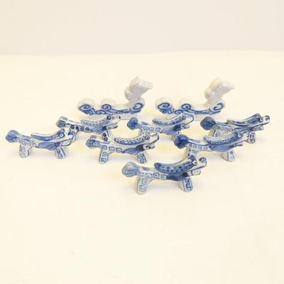 Lot #73 - Set of Vintage Blue and White Porcelain Foo Dog and Rabbit Chopstick Rests