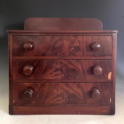 Diminutive Flame Mahogany Chest