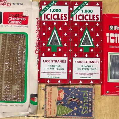 (5) Vintage Boxes Of Garland, Icicles, And Silverfoil Icicles