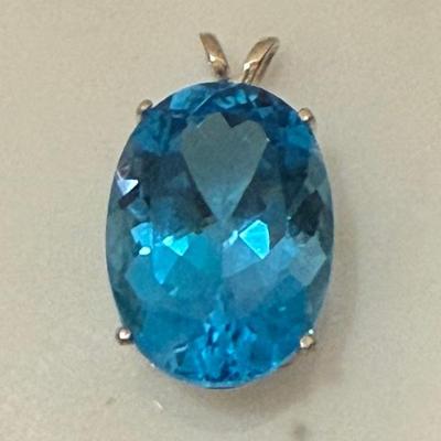 Vintage Sterling Silver .75 Inch Faceted Blue Topaz Pendant 