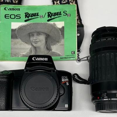 Canon Eos Rebel II Camera With Zoom Lens And Manual