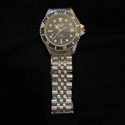 007-JR: Heuer Men’s 980.013 Calendar/Diver Wristwatch