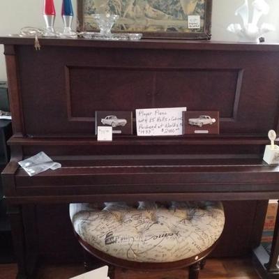 Player piano with 85 rolls 1st world's fair in Chicago.