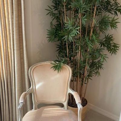 French influenced accent chair plant for staging