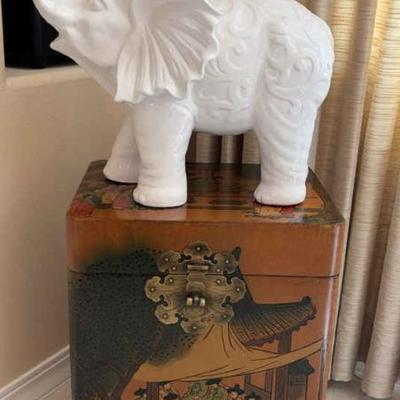 Small chinese trunk with ceramic elephant