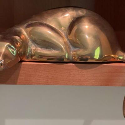 Dolbi cashier brass resting panther