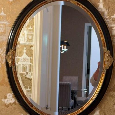 Wood framed oval mirror