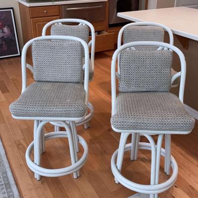 Four ratan bar stools