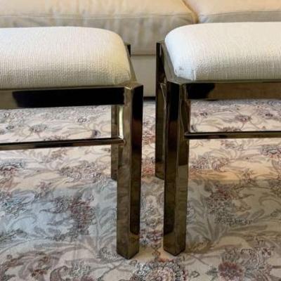Pair of brass upholstery stools