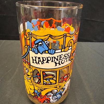 Lot 226: Vintage McDonald’s Muppets glass featuring the “Happiness Hotel”. 