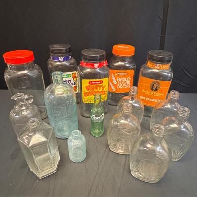 Lot 220: Vintage Needlers Candy Jars, 1776 Commemorative Bottles Plus Others 