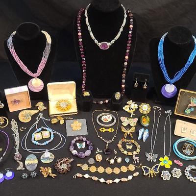 Colorful Floral, Butterfly, and Bird Themed Jewelry Featuring Monet