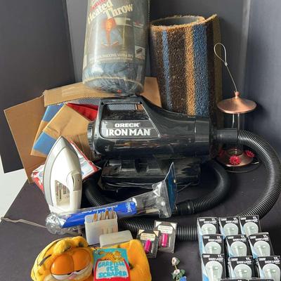 Household Goods Featuring an Oreck Ironman Vacuum