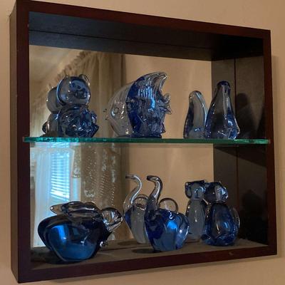 Shelf with Blue Glass Animals