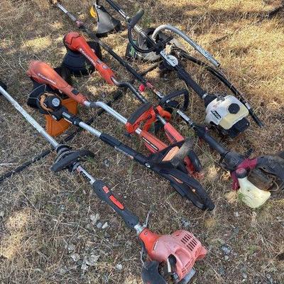 Sale Photo Thumbnail #109: #2502 • 5 Weed Wackers, 1 Branch Trimmer, 2 Weed Wacker Attachments
