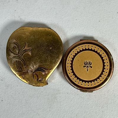(2pc) ANTIQUE MAKEUP COMPACTS | Antique makeup compacts including: Vollipte USA compact, and Elquin American compact - w. 3.25 x l. 3.5 in
