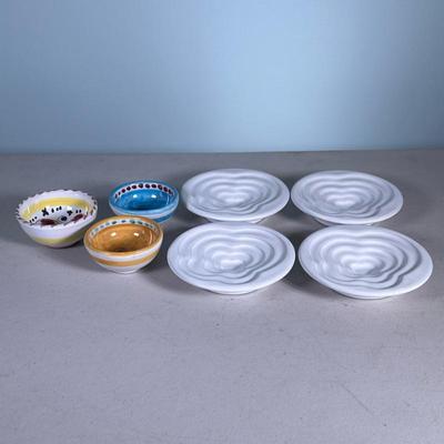 (7pc) Small Dishes | 4 white small dishes made in Italy and 3 small ceramic bowls signed on bottom. Dimensions: dia. 5 in (plate)