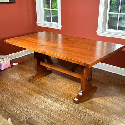 Trestle Dining Table | Finished wood farmhouse style kitchen table with seating for 6, having a nice wood finish - h. 30 x w. 36 x l. 66 in
