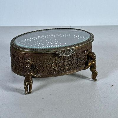 Vintage Ornate Jewelry Box | Small footed casket trinket box with beveled glass hinged lid and cherub legs - h. 3 x w. 5 x l. 6 in
