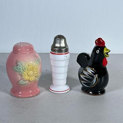 (3pc) Vintage Salt And Pepper Shakers | Black rooster with cork stopper, white milk glass with red trim and Hull Pottery shaker. - h. 4.5...