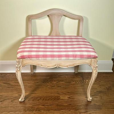 LOW SLIPPER CHAIR | Carved wood slipper chair with gingham upholstery over cabriole legs; seat height 18.5 in - h. 27.5 x w. 25.5 x d....