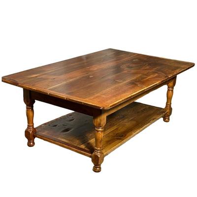 Rustic wooden Coffee Table | Rustic table with lower shelf, carved legs and rough wood with knots. - h. 17.5 x w. 29.5 x l. 48 in
