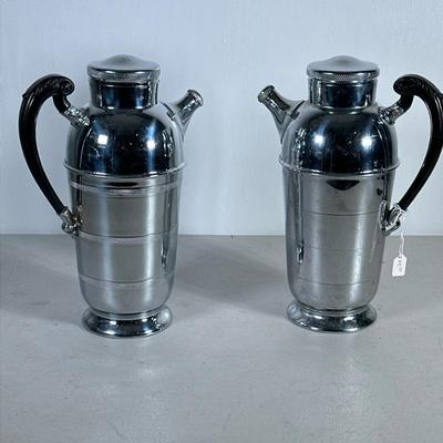 (2pc) Cocktail Shakers | Chrome shakers with black handles. Both by Farber Brothers. - d . 11 x w. 8 in