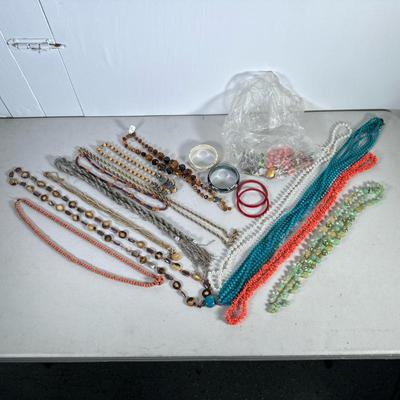 Vintage Costume Jewelry | Variety of beads, coral, faux pearls and bracelets.
