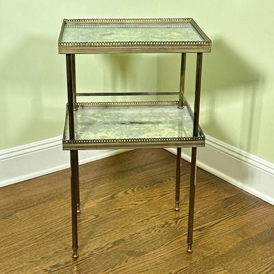 Bronze Tea Table | Bronze/brass tea table with smoky mirror shelves. Eyelet trim around shelves. - h. 26 x w. 12.5 x l. 15.5 in
