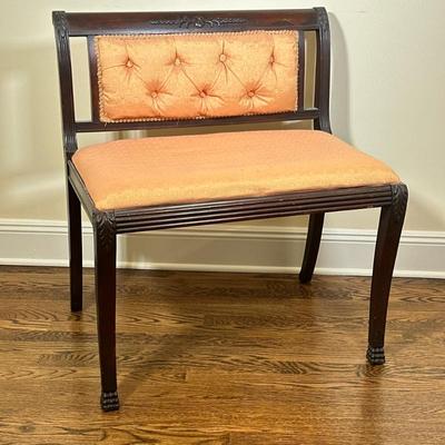 SMALL UPHOLSTERED BENCH | Having dark carved wood back with pink upholstered cushions over claw feet: seat height; 19 in - h. 30.5 x w....