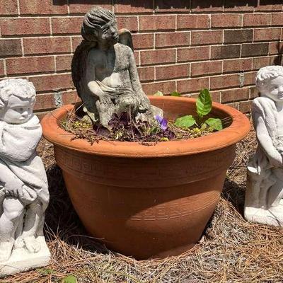 Three Stone Sculptures Of Children & A Ceramic Planter