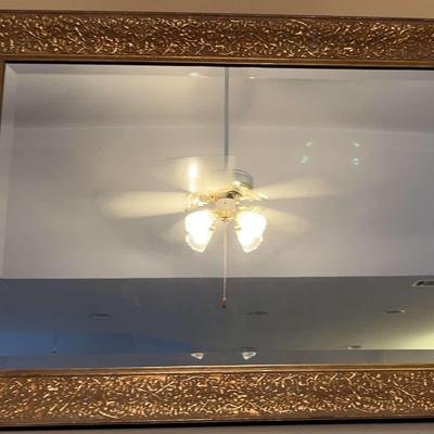 Large Beveled Mirror With Detailed Gold-Colored Frame